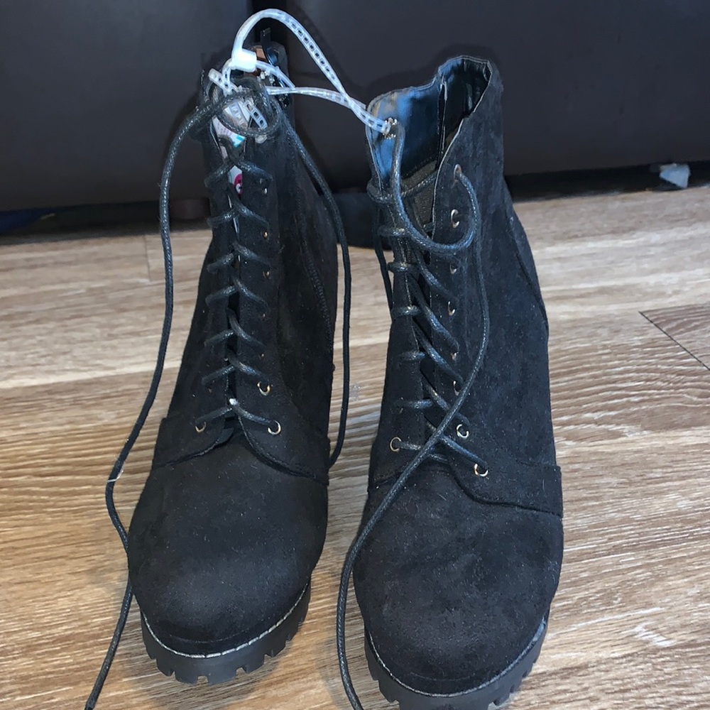 Laced up heeled booties
